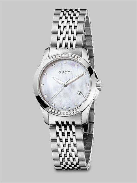 gucci mother of pearl bangle watch|gucci g timeless diamond watch.